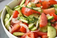 Refreshing Tomato and Cucumber Salad with Herb Vinaigrette