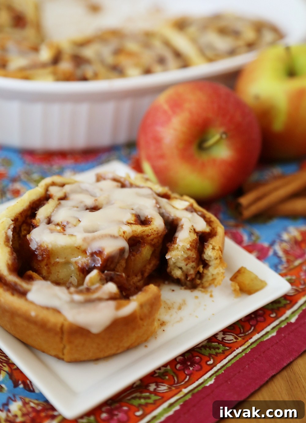 Gooey Apple Pie Cinnamon Rolls - Served on a plate