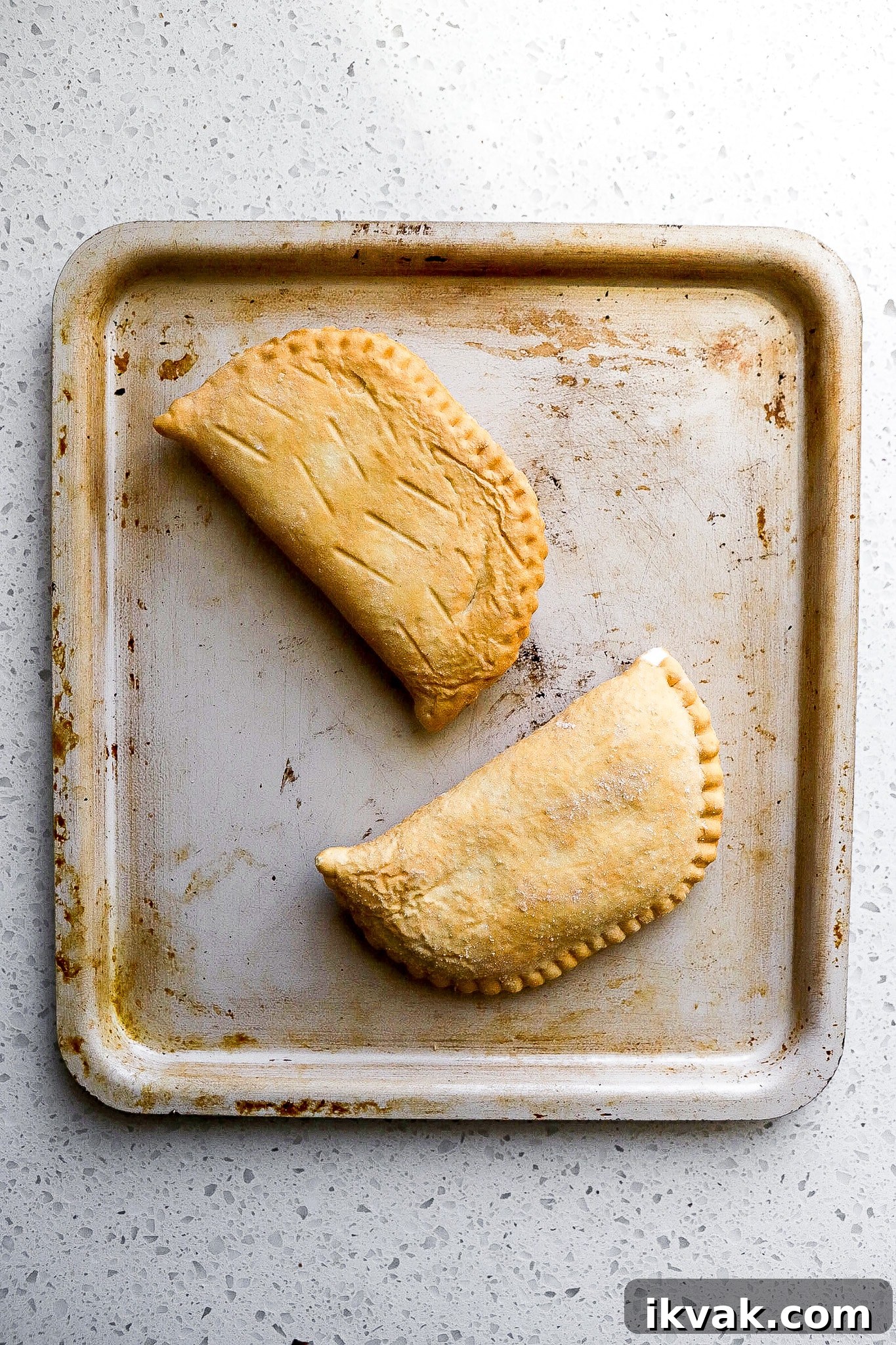 Crispy Air Fryer Frozen Pizza Pops Recipe 5 Top down view of air fryer pizza pops on air fryer tray.