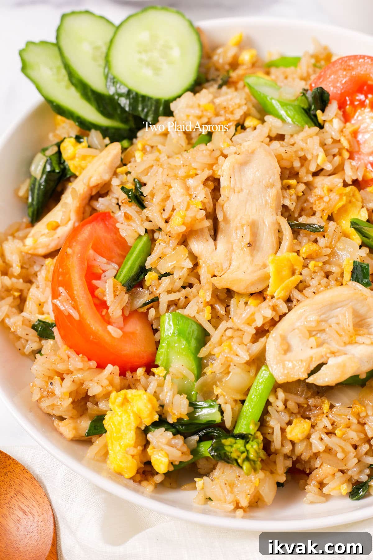 Close up shot of Thai fried rice on a plate.
