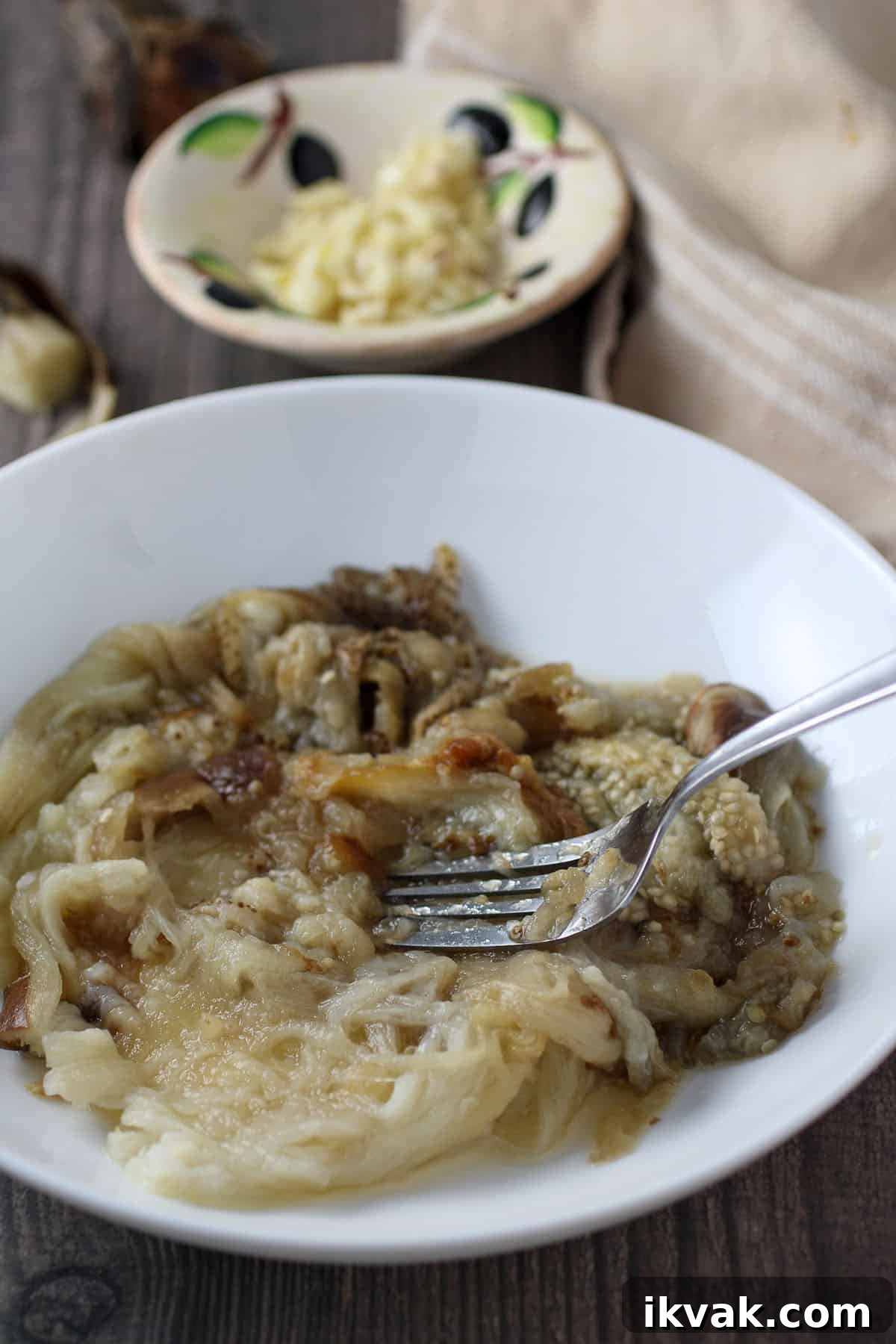 Cocido: Traditional Spanish Stew Recipe and Serving Guide 5 making berenjana sauce in a bowl