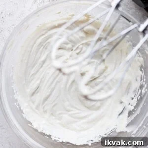 Cream cheese frosting in a bowl.
