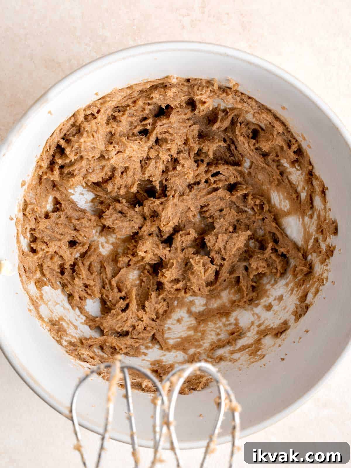 Chocolate Chip Cookies Made with Sourdough Discard 4 Softened butter and brown sugar mixed in a bowl with a hand mixer.