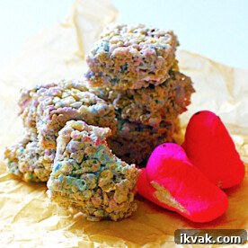 A pile of colorful rice krispie treats made with marshmallow peeps.