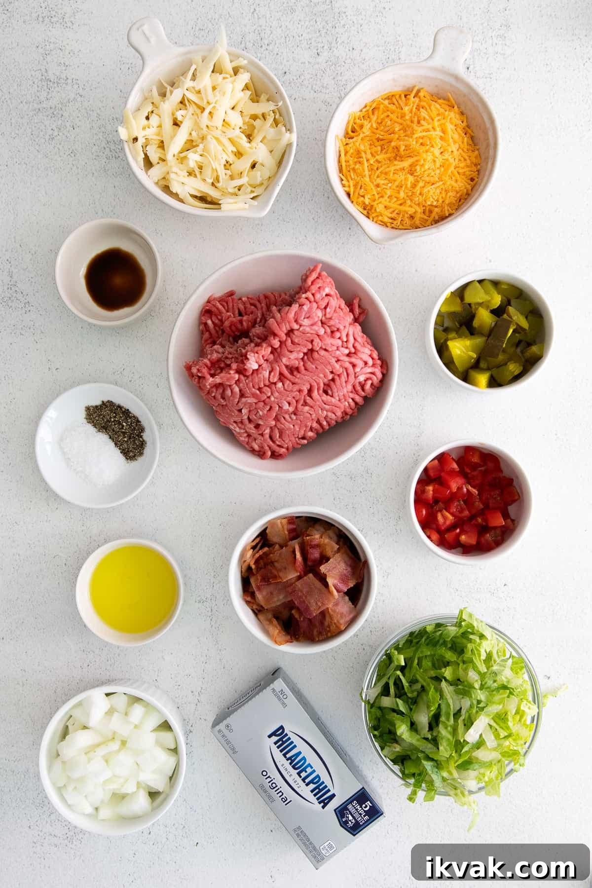 Loaded Cheeseburger Dip Recipe: Crowd-Pleasing Party Appetizer 3 Ingredients for cheeseburger dip in small bowls.
