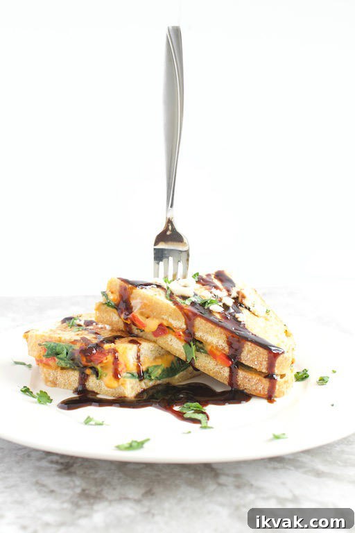 Savory French Toast Recipe on Plate Stabbed with Fork