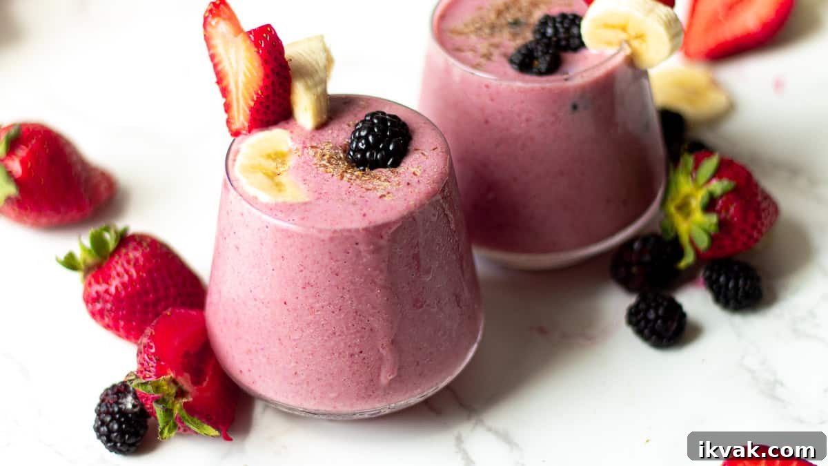 Creamy Blackberry, Strawberry & Banana Smoothie Recipe 7 blackberry strawberry banana smoothie in glasses with fruit garnish