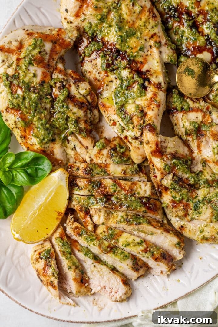 grilled and sliced chicken breast topped with pesto and balsamic glaze