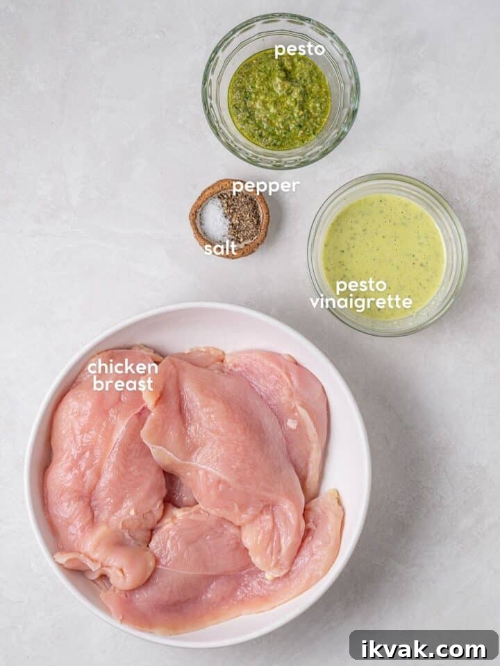 Labeled ingredients for recipe, including chicken breast, pesto vinaigrette, pesto, salt, and pepper