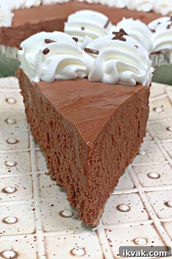 No-Bake Chocolate Truffle Pie Recipe: Creamy Decadent Dessert 4 No Bake Chocolate Truffle Pie has that deep down, rich chocolaty taste that completely satisfies.
