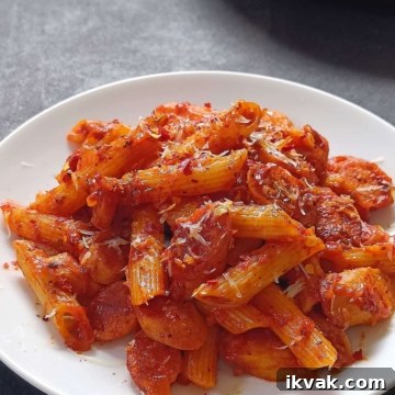 Image showing spicy sausage penne pasta on a white plate.