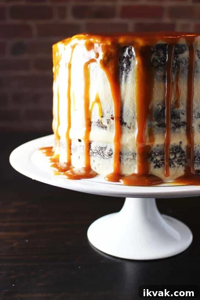 Closeup of caramel chocolate cake on a plate with coconut caramel frosting and caramel drizzle 