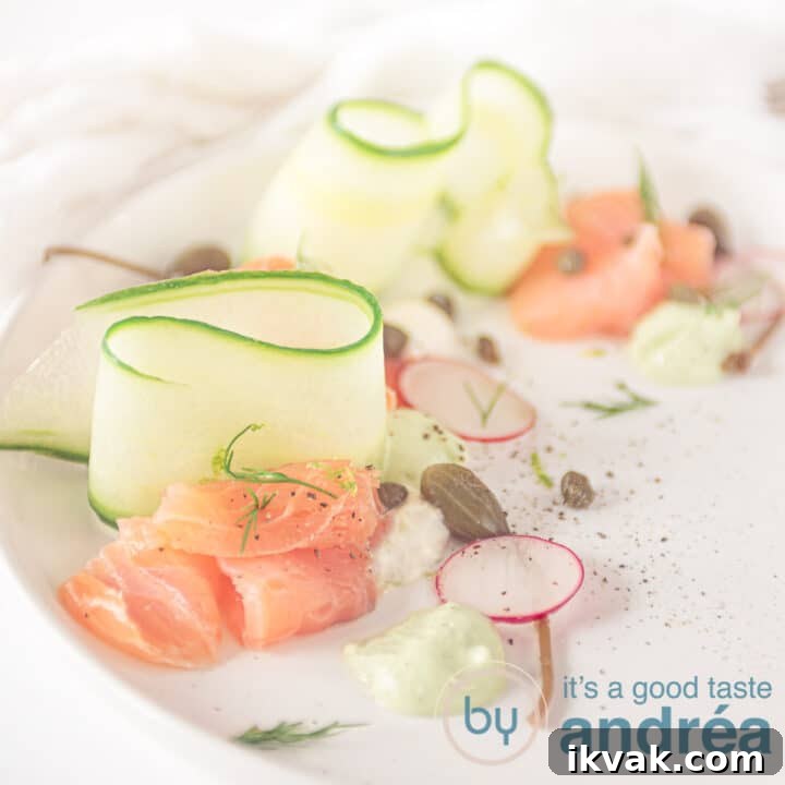 square picture of smoked salmon, cucumber ribbons and cream