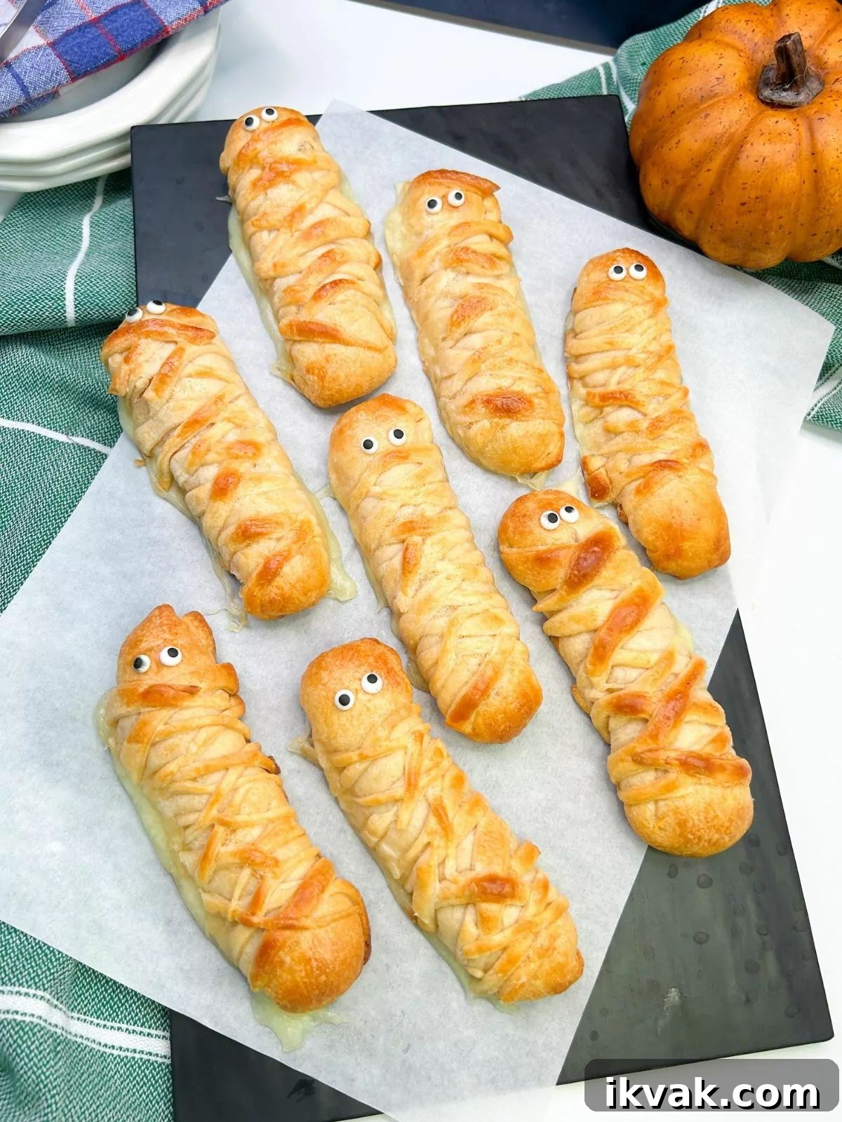 27 Spooky Halloween Appetizers Adults Will Love 14 12. Mummy Mozzarella Sticks