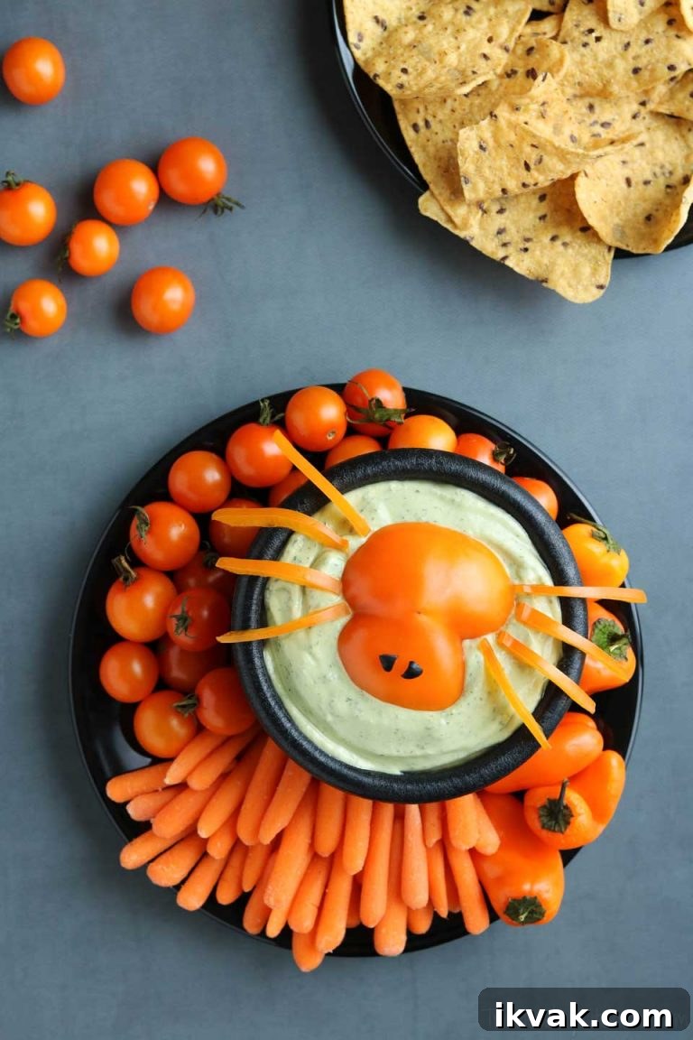 27 Spooky Halloween Appetizers Adults Will Love 24 22. Spooky Spider Dip