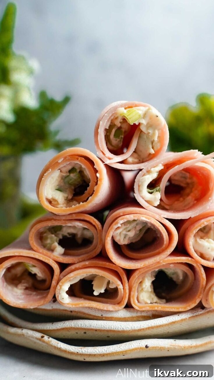27 Spooky Halloween Appetizers Adults Will Love 9 Ham Roll Ups with Cream Cheese