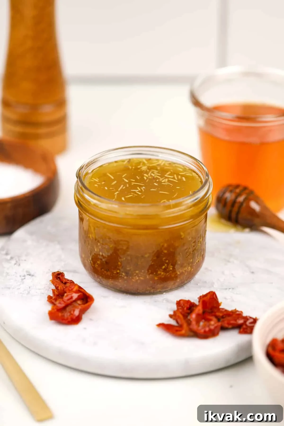 A mason jar filled with homemade dressing.