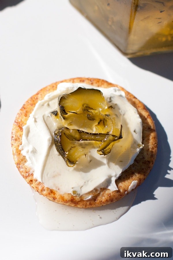 How to Make Zucchini Jam: Sweet Homemade Recipe and Tips 3 a cracker topped with cream cheese and jam.