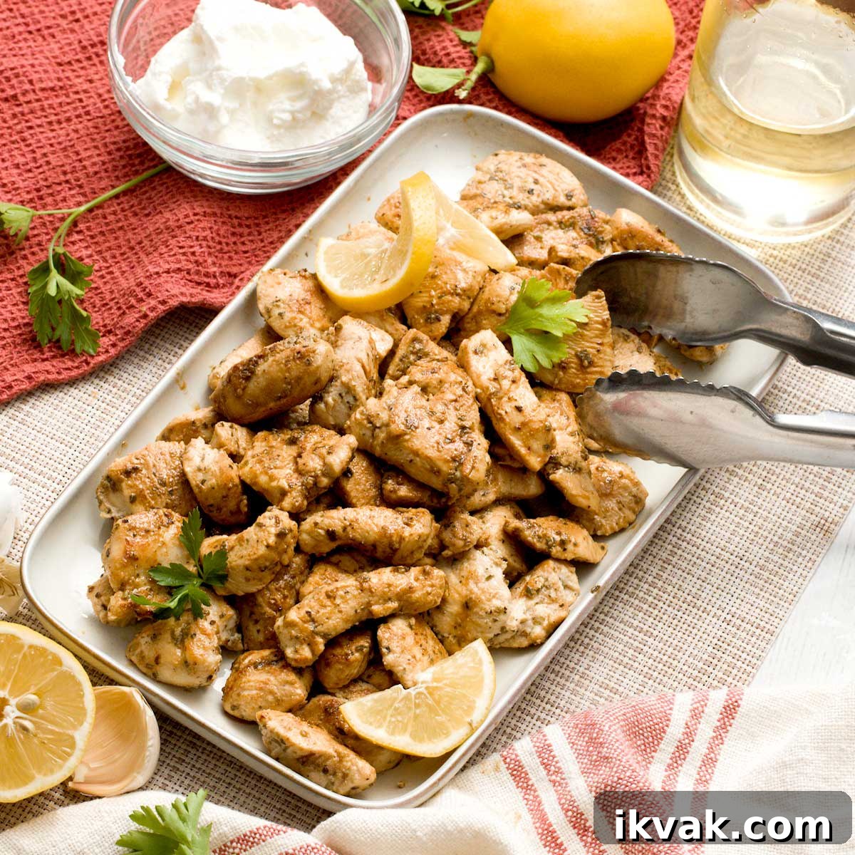 Honey Garlic Pan-Seared Salmon in a HexClad Skillet 14 A dish with greek yogurt marinated chicken breast diced in bite-sized pieces.
