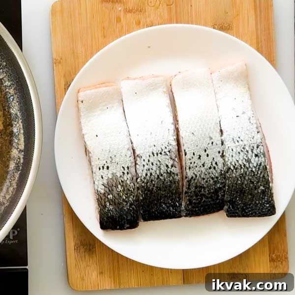 Honey Garlic Pan-Seared Salmon in a HexClad Skillet 8 Resting salmon on a plate.