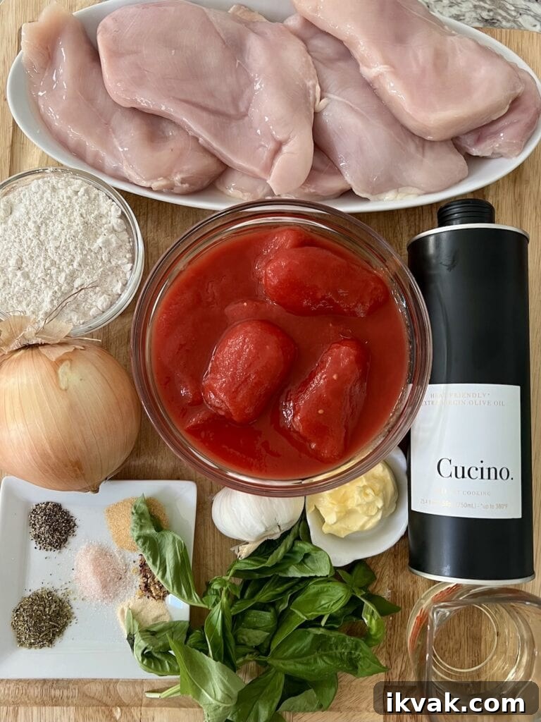 All ingredients for Easy Chicken Pomodoro recipe on cutting board.