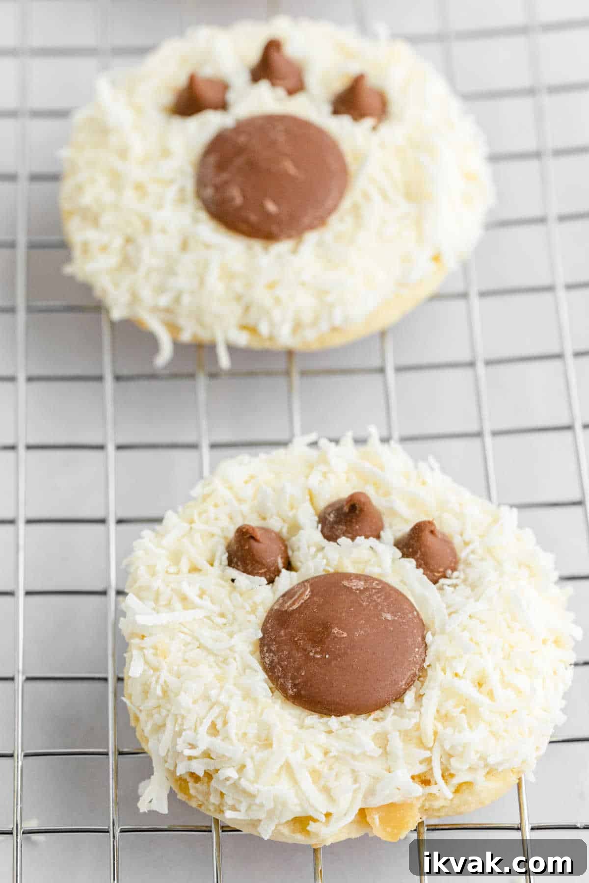 Bear paw cookies on a wire rack.