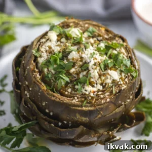 Mediterranean-Style Baked Artichokes with Lemon and Herbs 7 Mediterranean Baked Artichokes topped with feta and parsley