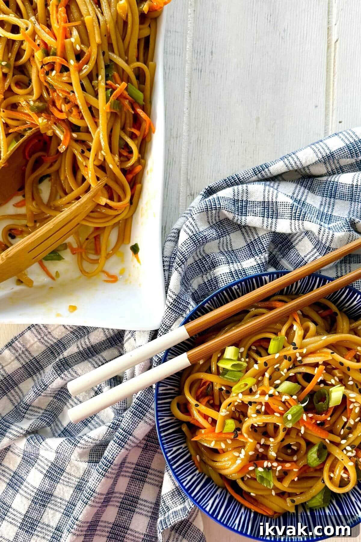 sesame noodles in a bowl with a napkin.