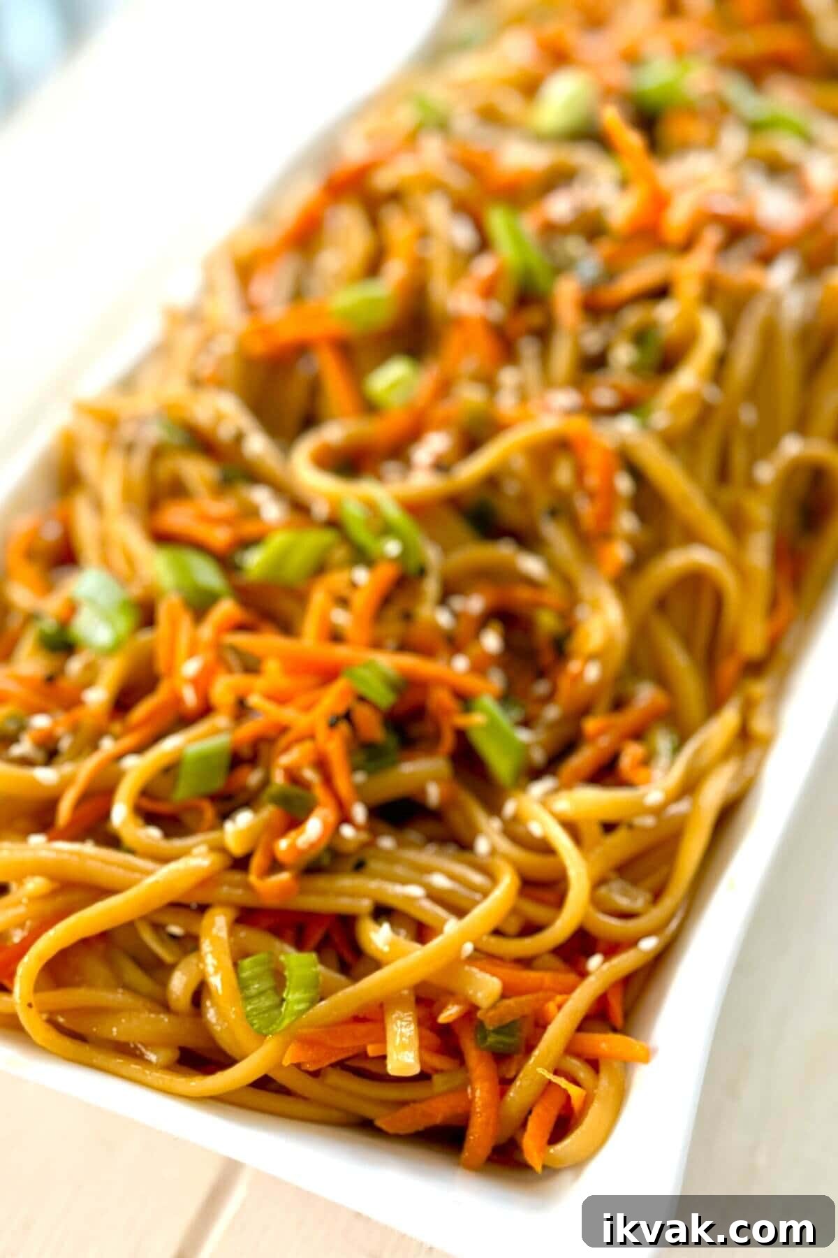 large serving dish with Asian noodles.