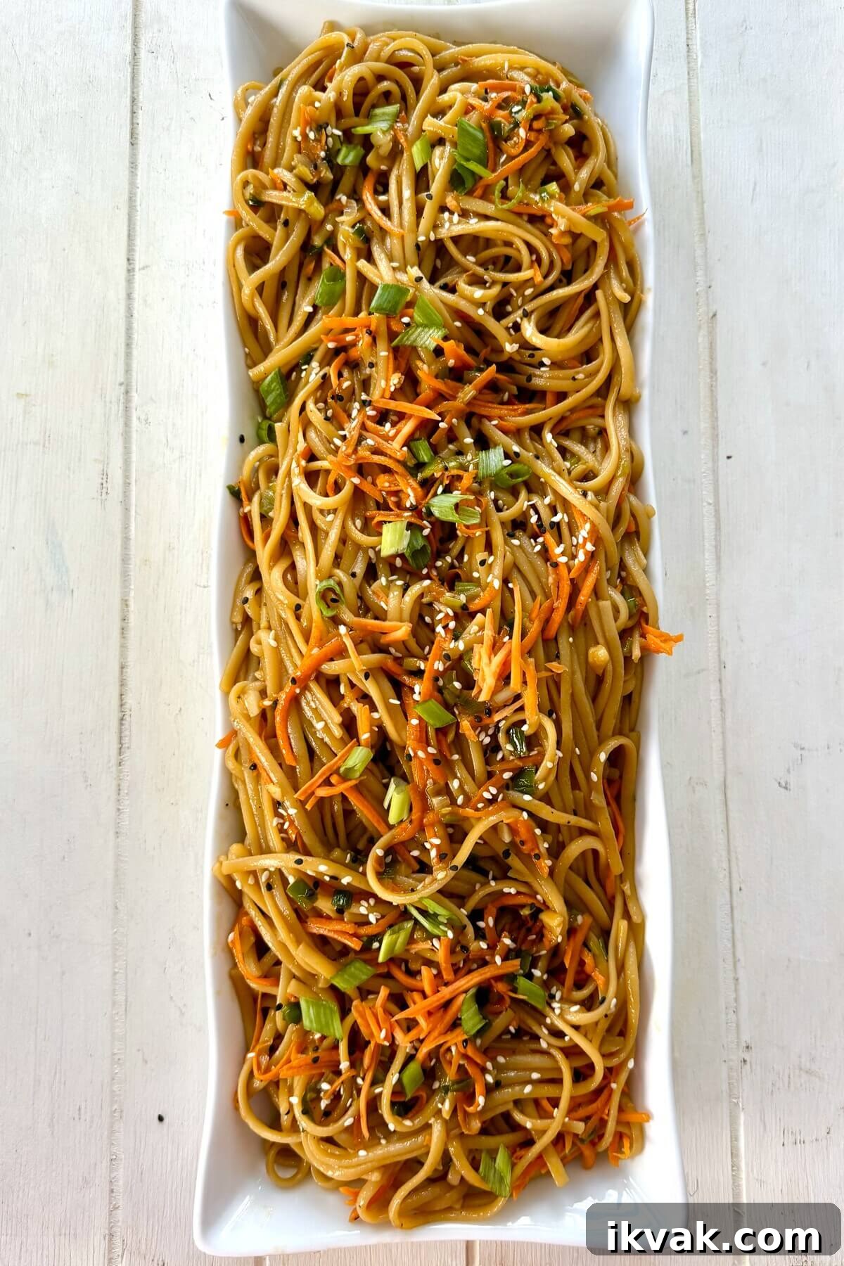 serving dish of garlic sesame noodles.