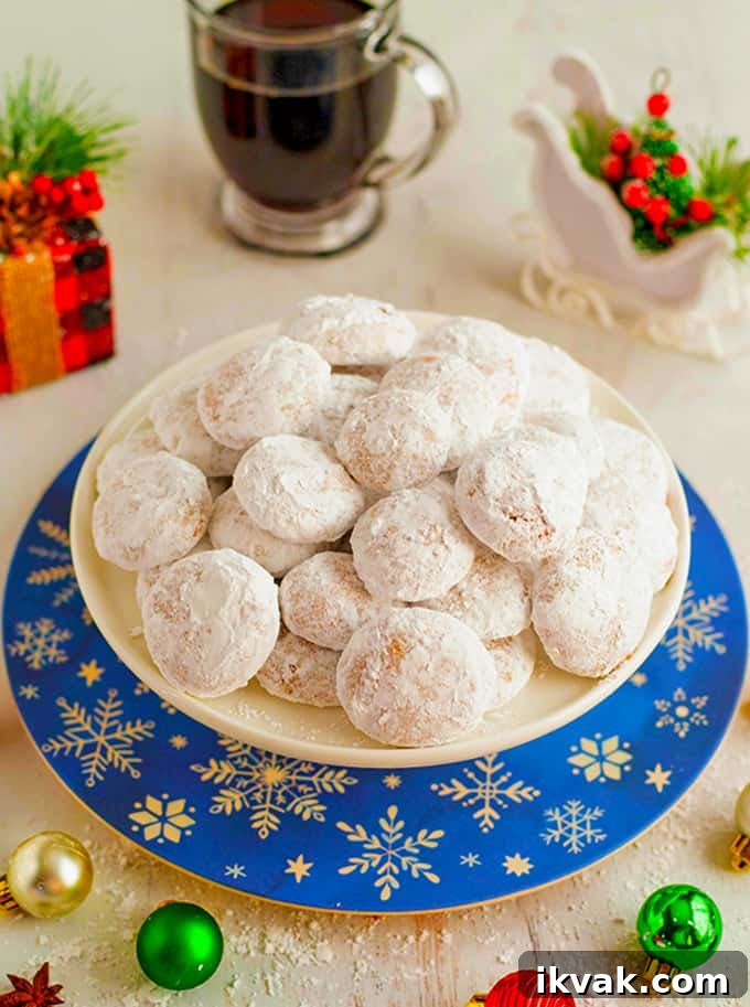 Pfeffernüsse: Traditional German Christmas Spice Cookies 3 A plate of white Christmas cookies