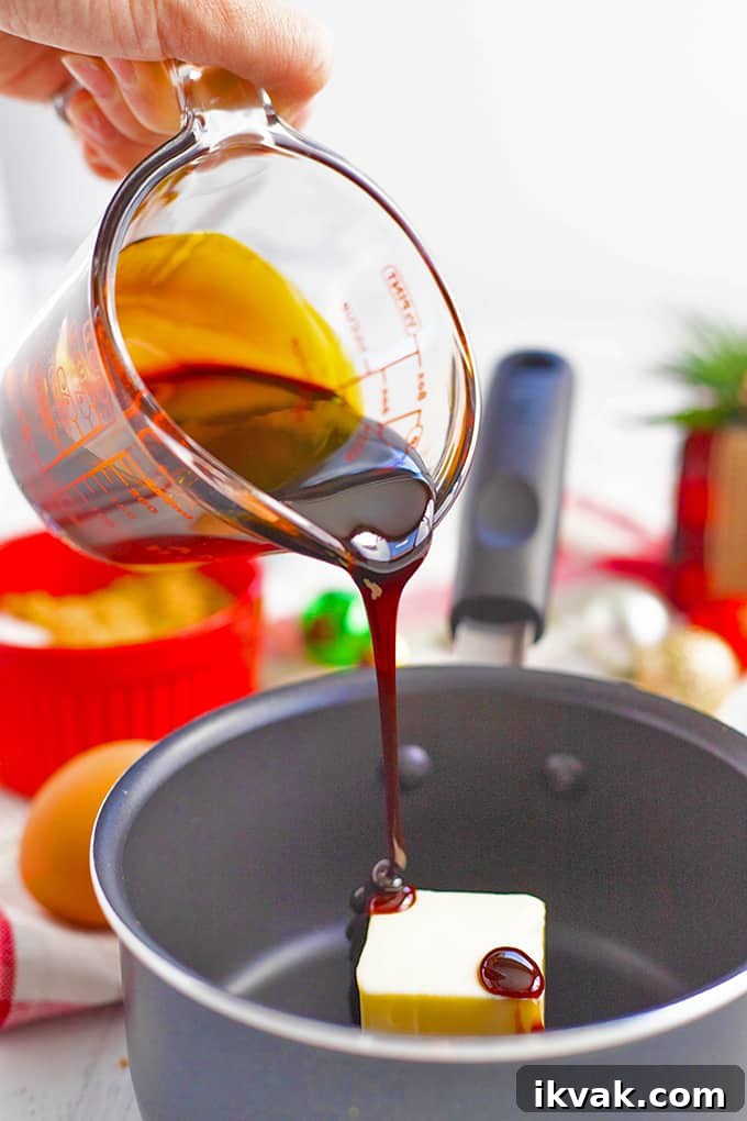 Pfeffernüsse: Traditional German Christmas Spice Cookies 5 Pouring ingredients into a pan