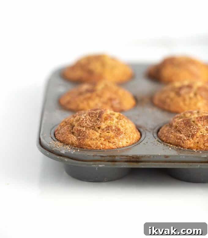 Metal muffin tin of banana muffins