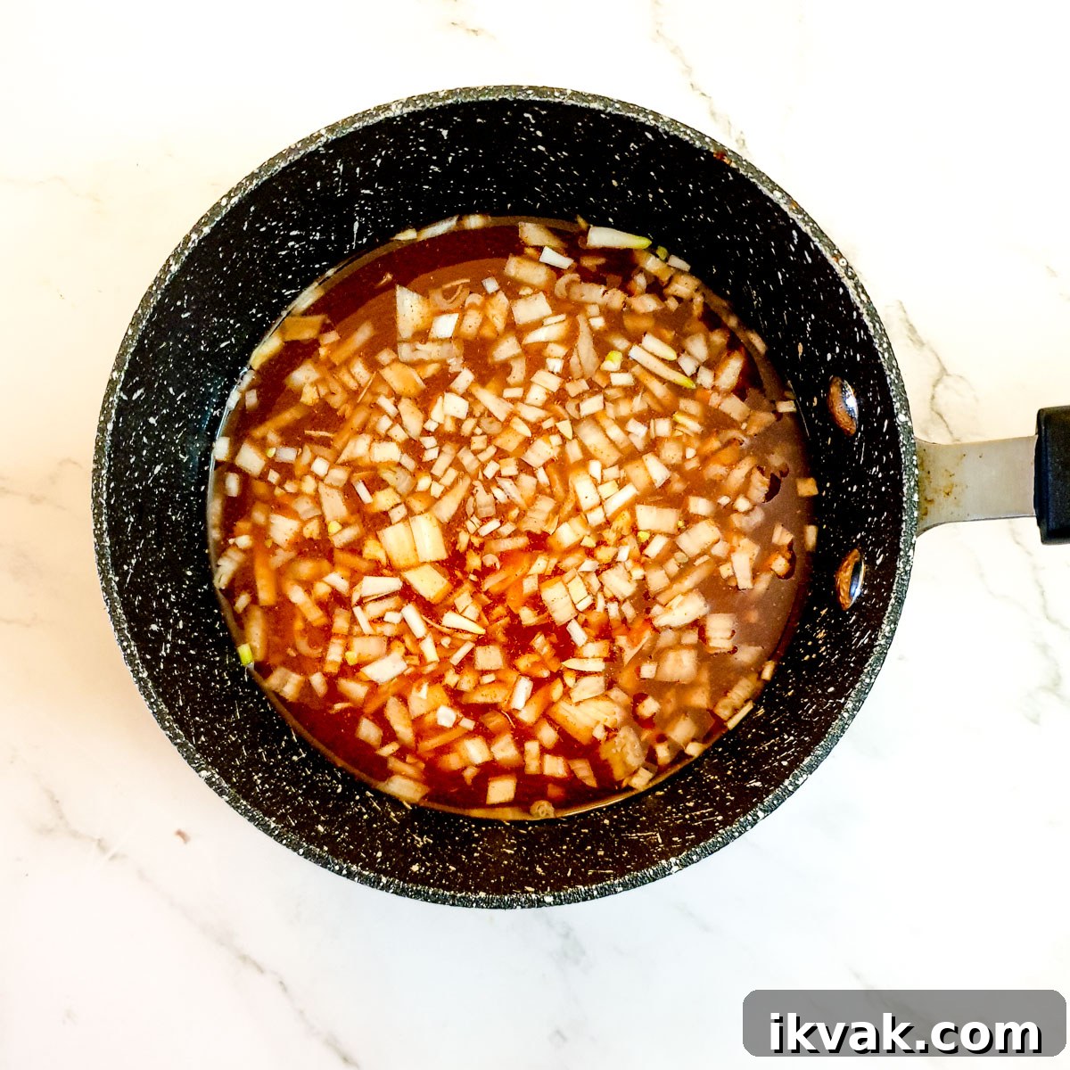 Ingredients for Durky sauce in a saucepan.