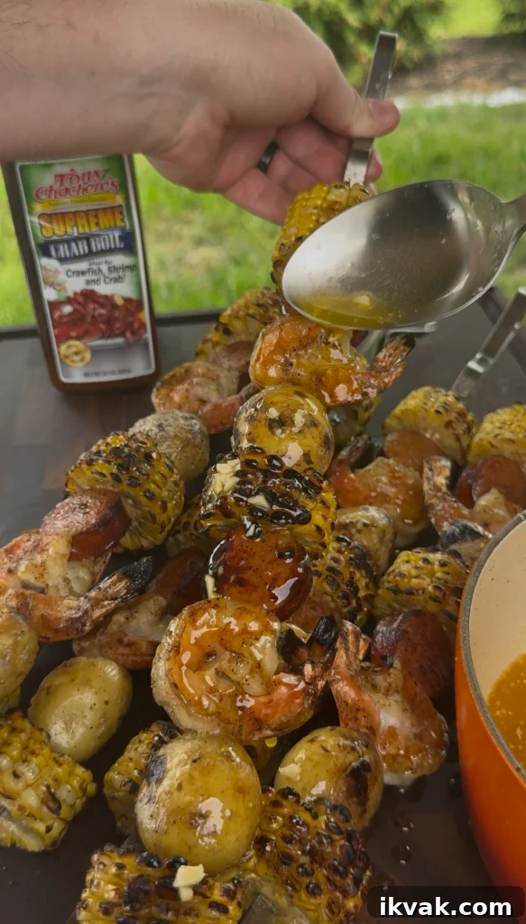 covering seafood boil in garlic butter