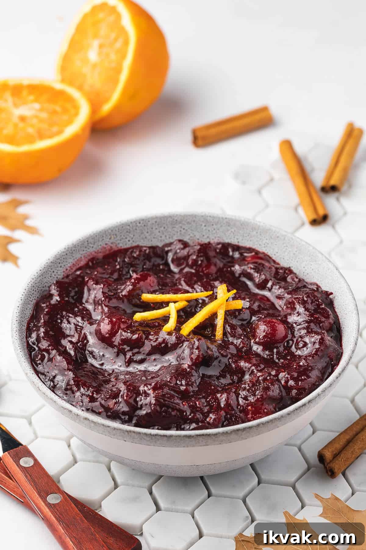 An angled view of a bowl of crockpot cranberry sauce.