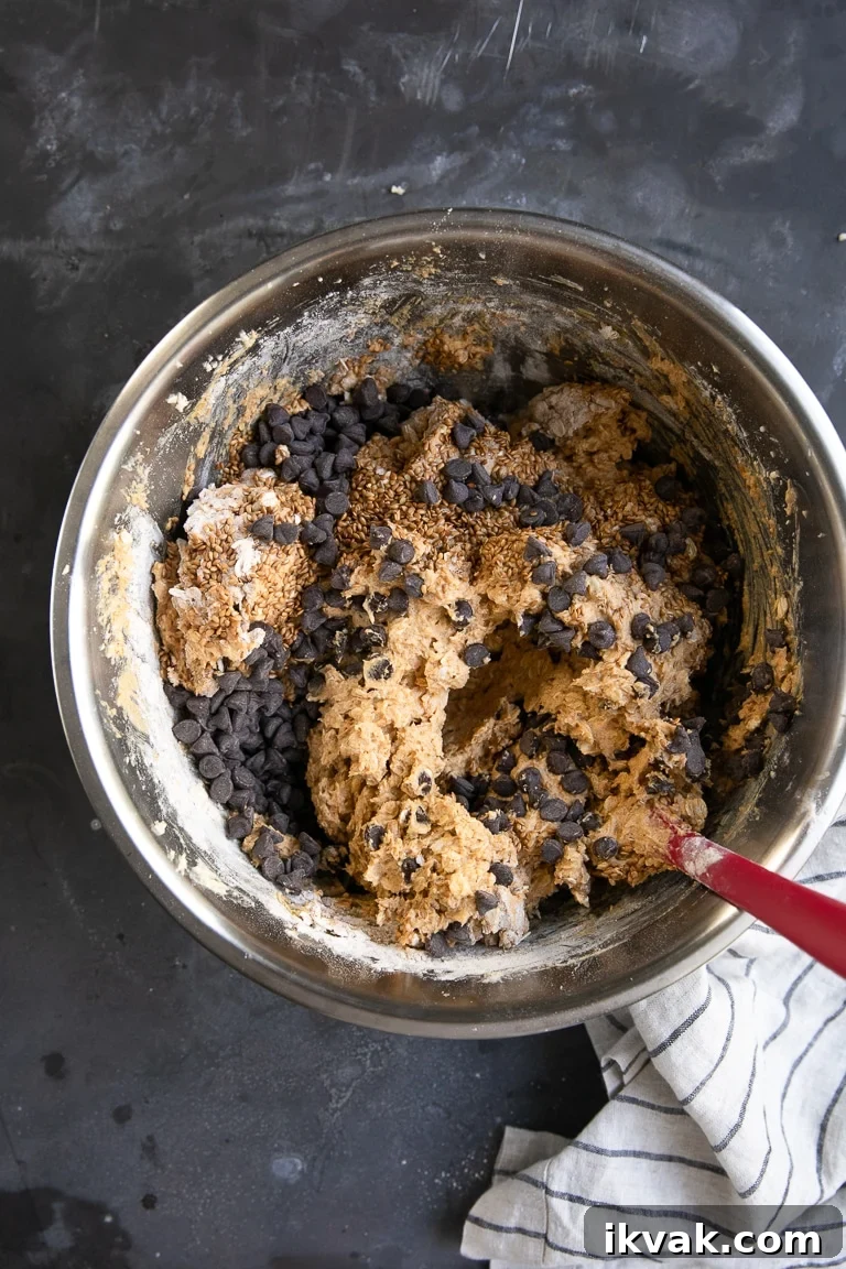 oats flour and spices pumpkin chocolate chips in mixing bowl