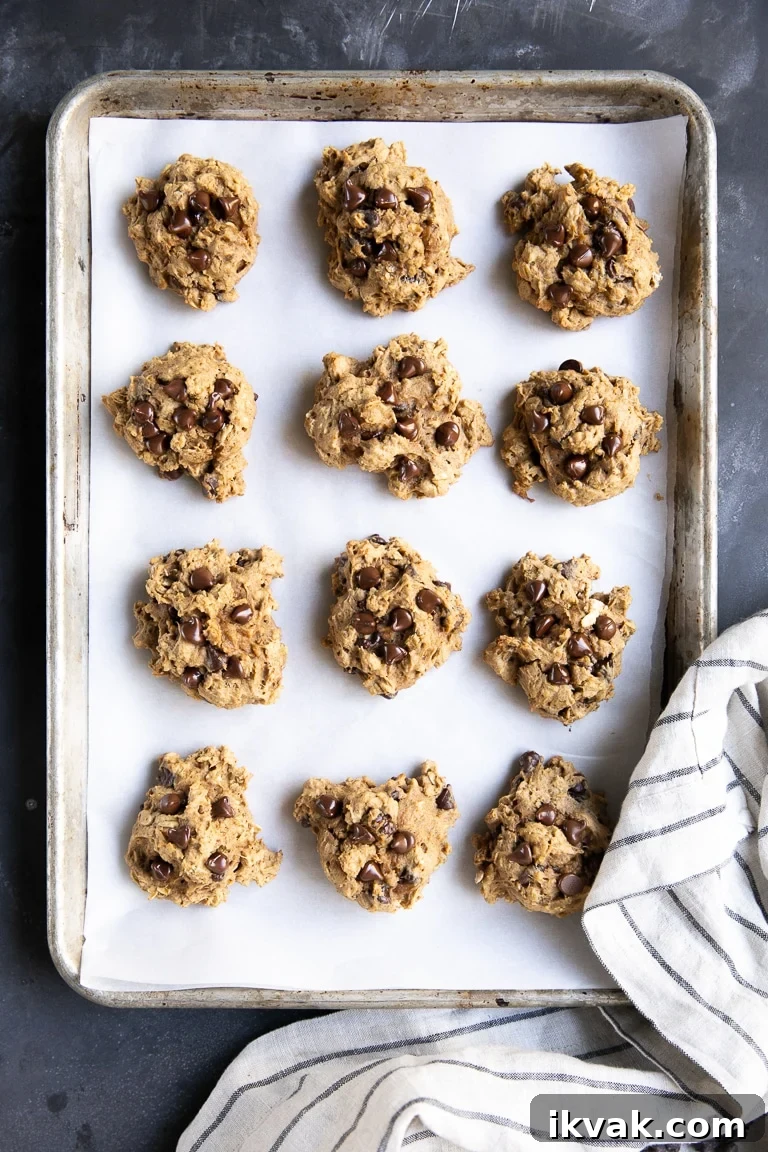 pumpkin cookies on baking sheet