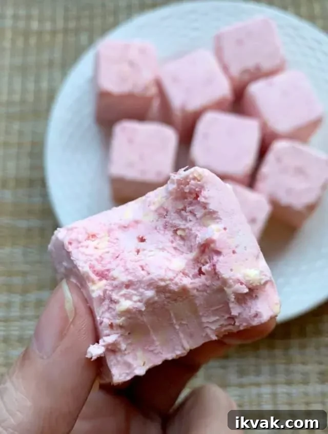 bite of strawberry cheesecake fat bomb