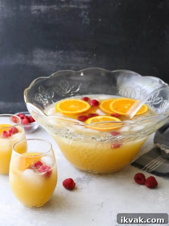 This big batch of mimosas served in a punch bowl is perfect for a brunch party!