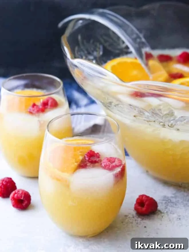 This big batch of mimosas served in a punch bowl is perfect for a brunch party!