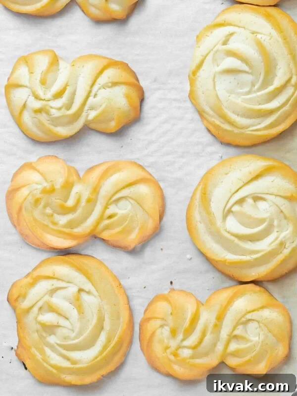 butter cookies baked on parchment paper