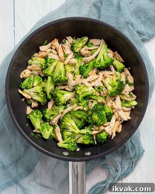 Keto Egg Foo Young Recipe: Low-Carb Chinese-Style Omelette 9 Sautéing the chicken and veggies.