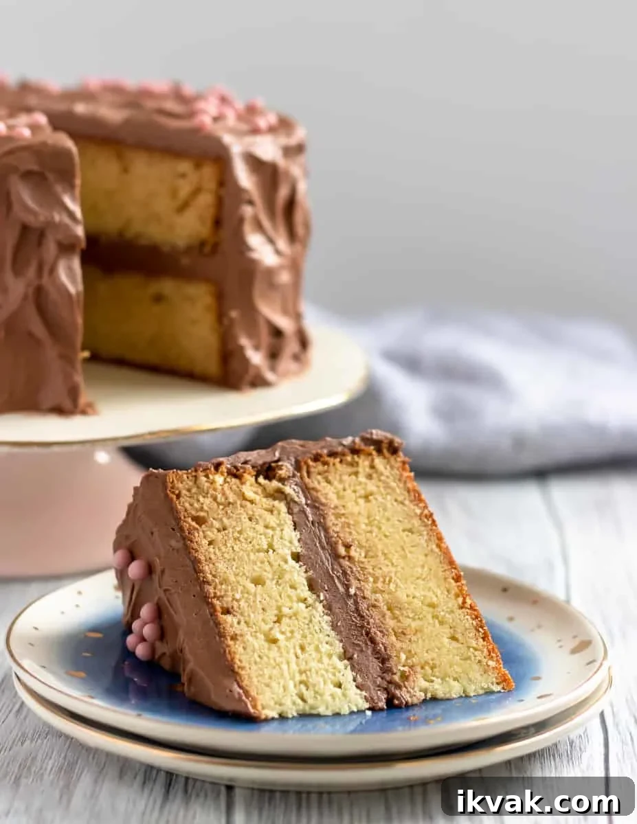 When you need a classic vanilla cake, this yellow cake recipe from scratch is what you want! A moist and flavorful butter cake, this from scratch vanilla cake recipe is a sure to please your people. * Recipe on GoodieGodmother.com
