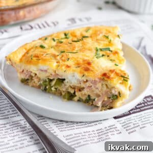 Asparagus, Ham & Goat Cheese Crustless Quiche Recipe 12 This is a square picture of a slice of quiche.