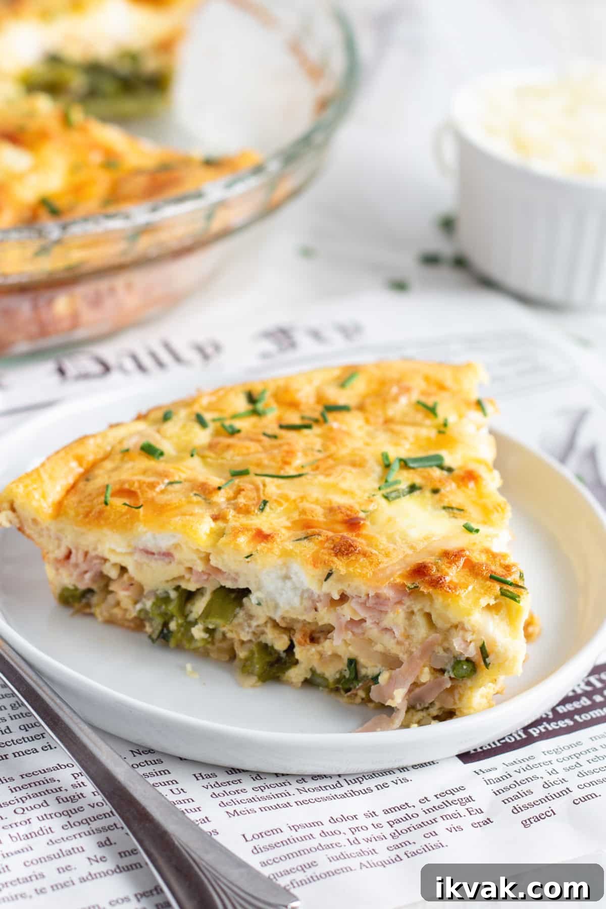 Asparagus, Ham & Goat Cheese Crustless Quiche Recipe 3 This is a picture of a slice of crustless quiche with asparagus, ham and goat cheese.