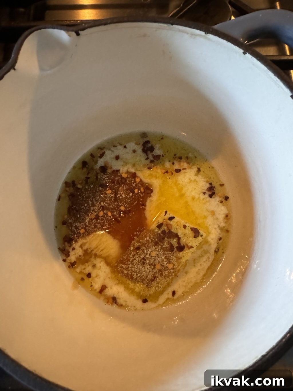 The butter, honey, and spice mixture in a pot.