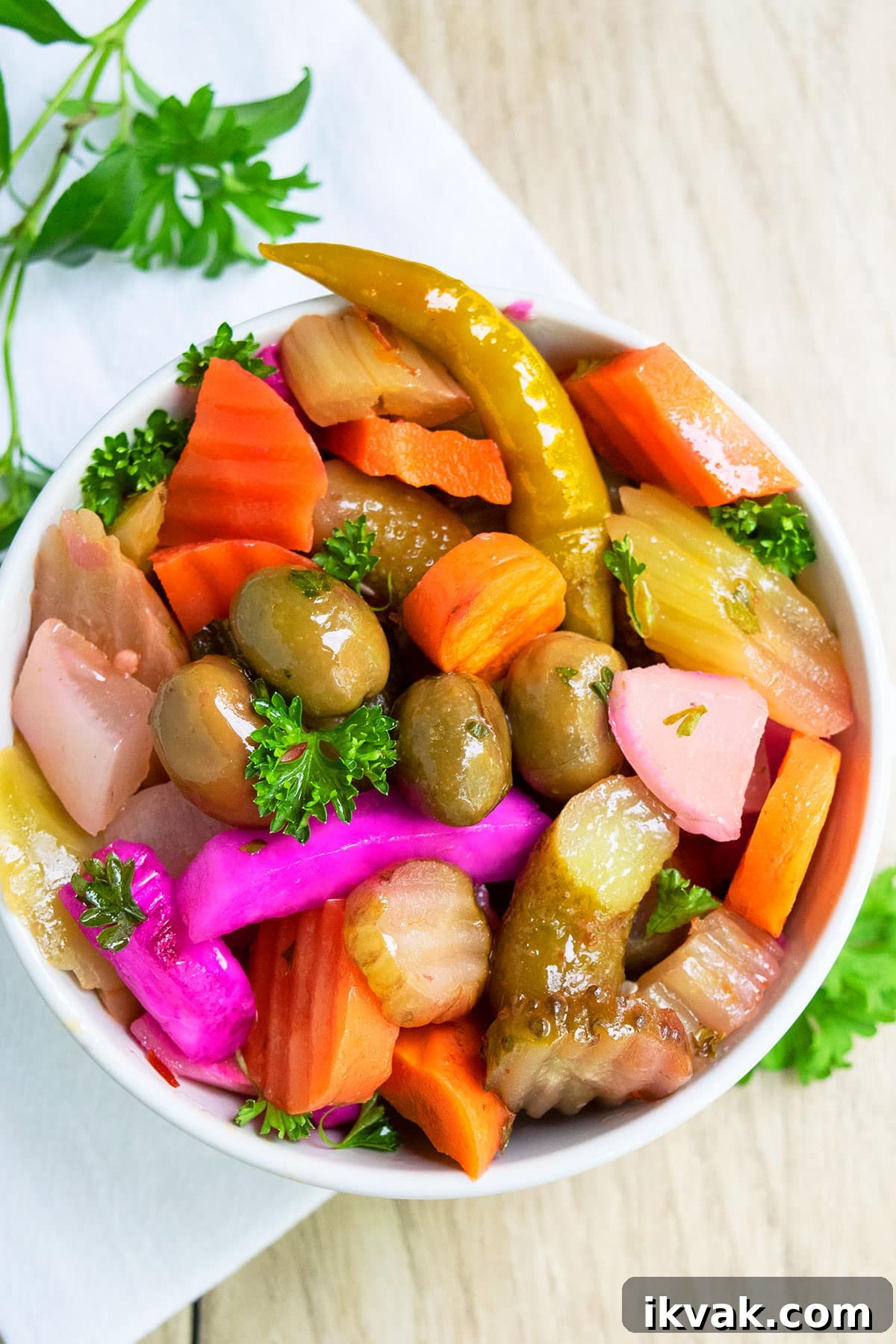 One-Pot Quick Pickled Vegetables for Crispy, Tangy Snacks 2 Quick pickled vegetables in white bowl- Overhead shot.