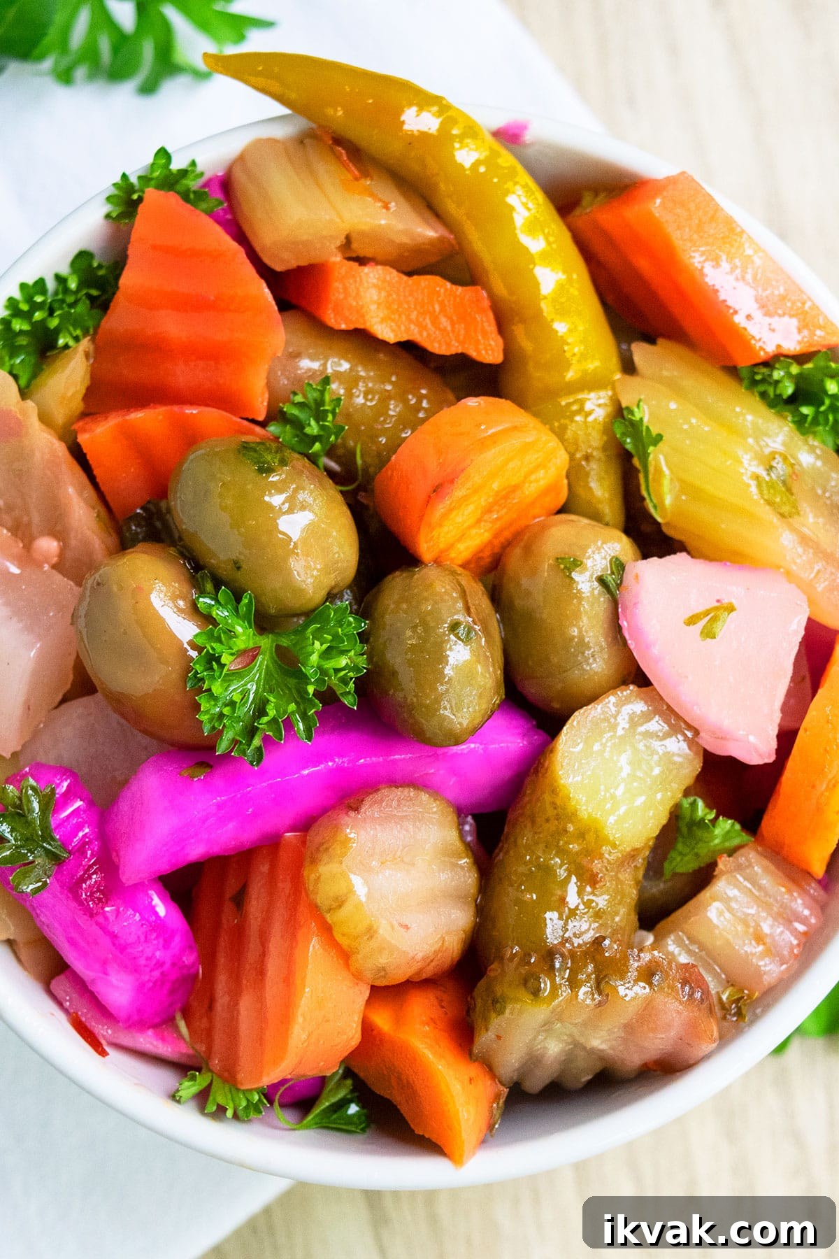 One-Pot Quick Pickled Vegetables for Crispy, Tangy Snacks 5 Homemade vegetable condiment in white bowl- Closeup shot.