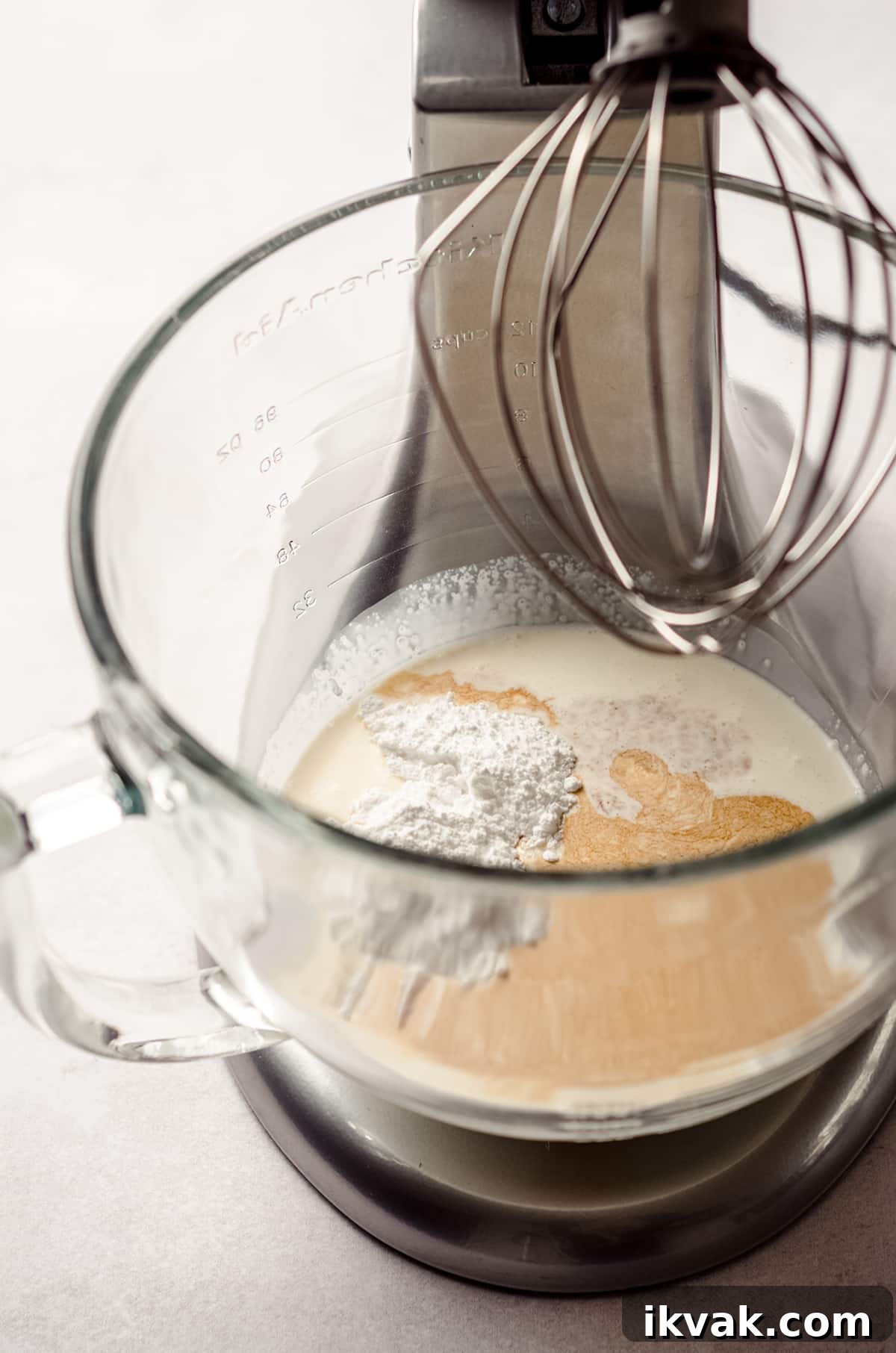 process shot for homemade whipped cream in a stand mixer